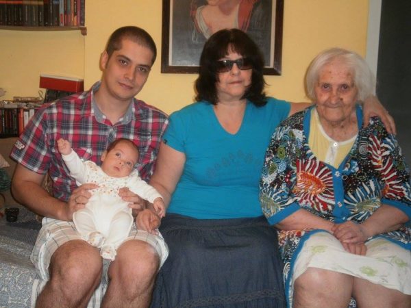 Our family's savior, my grandmother, my mother, myself and baby Romanian. Four generations on one couch.