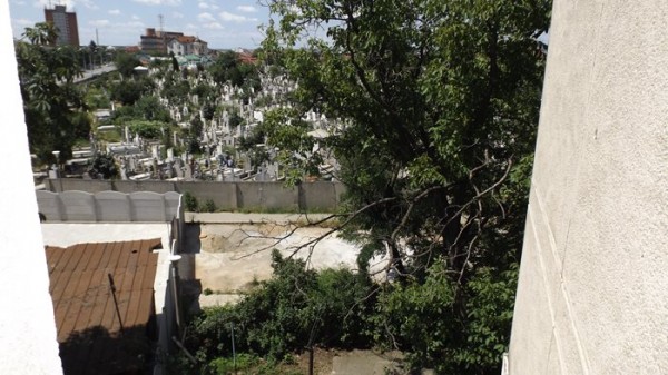 The view from the small bedroom. Not enough trees to block the cemetery view.