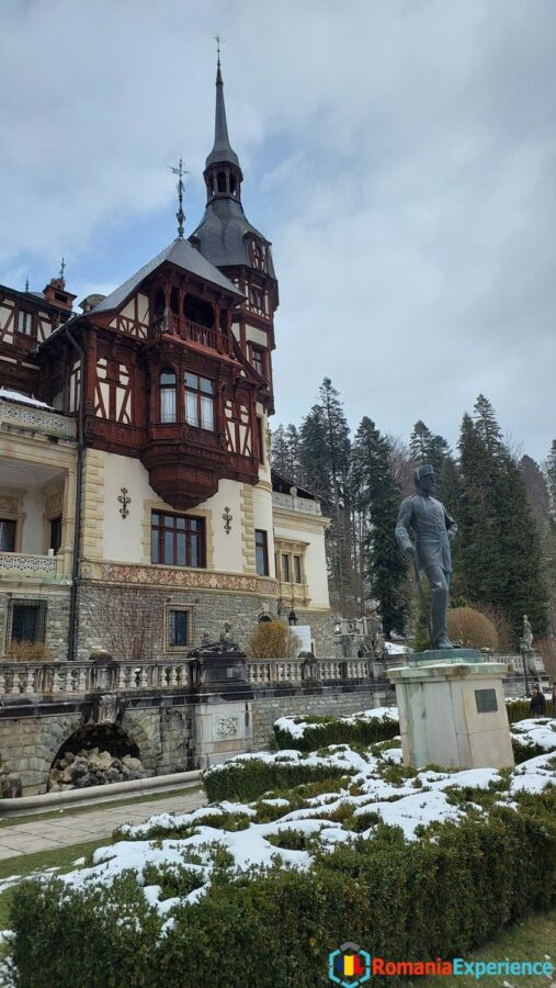 King Carol statue in front of Peles Castle