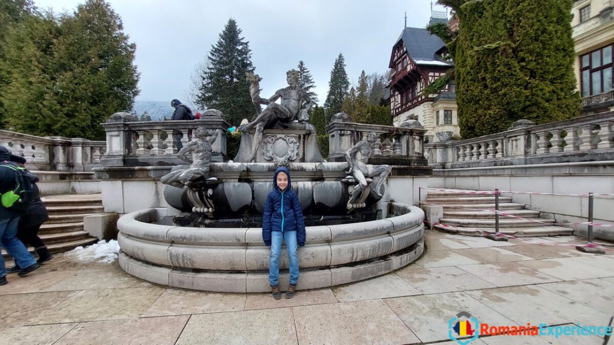 my son outside Peles castle