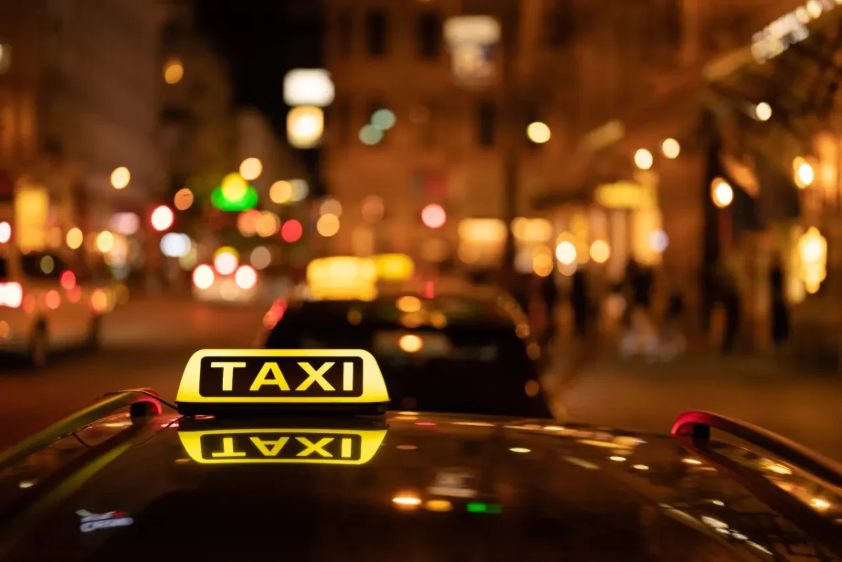 car with taxi sign