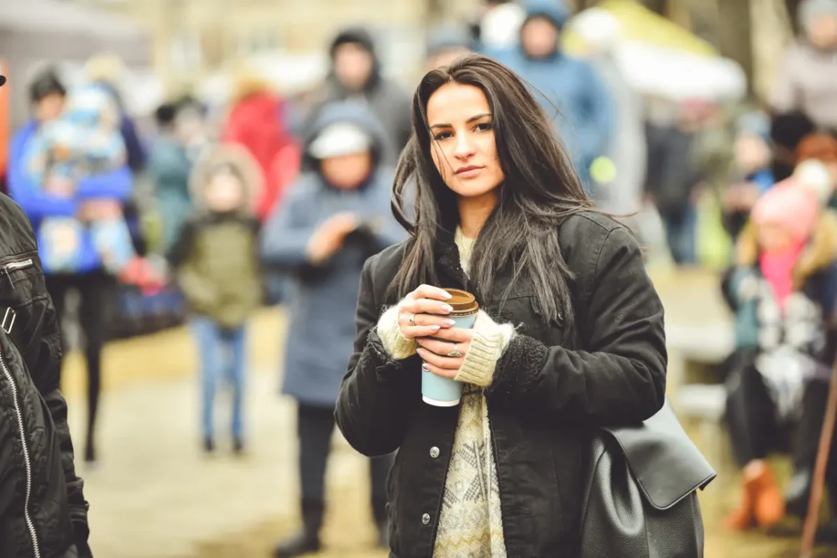 Romanian woman drinking coffee