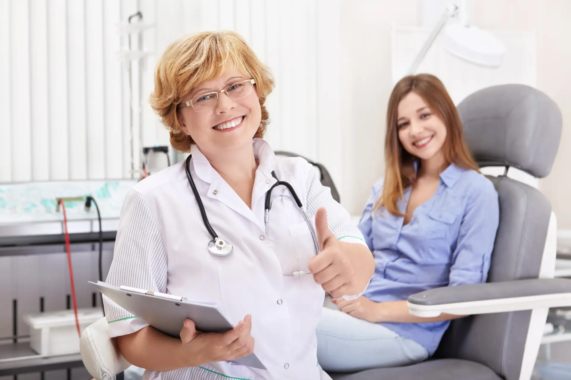 happy doctor and patient in a Romanian clinic