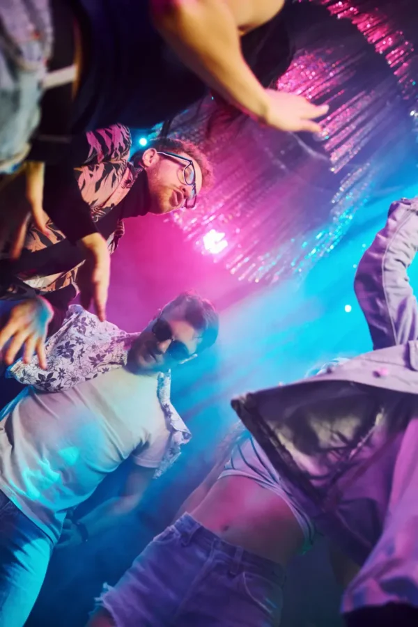 people dancing on manele in the club