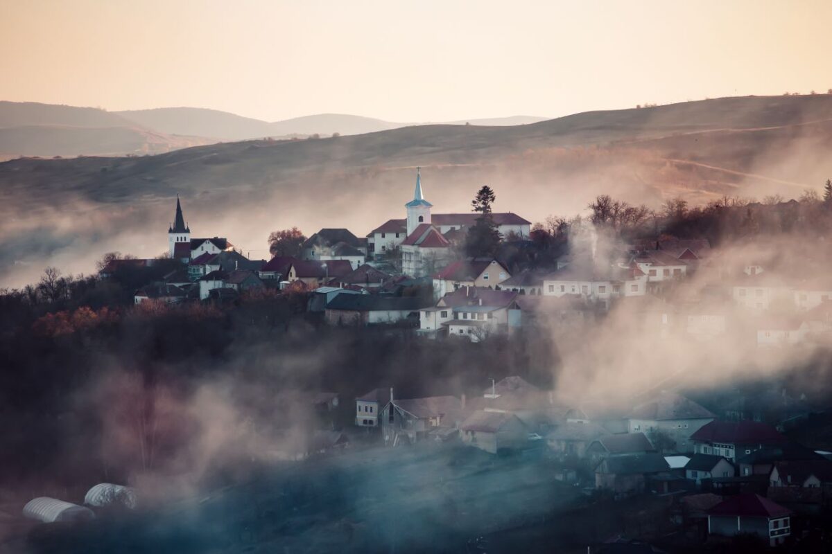 beautiful view of foggy Tranylvanian village