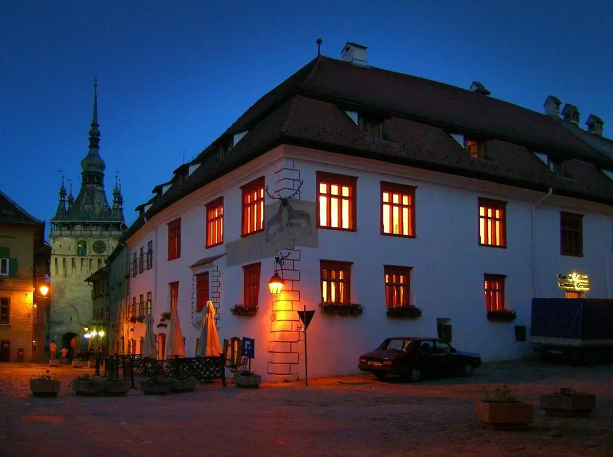View of Casa cu Cerb at night